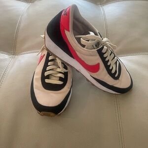 Nike Black and White/cream Sneakers with red Swoosh